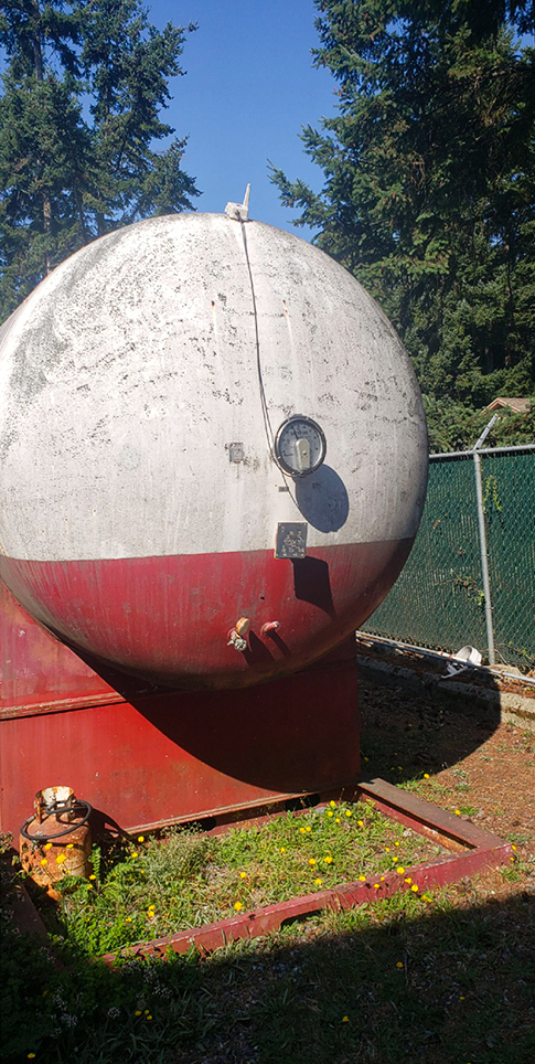 before-power-wsahed-residential-large-propane-tank