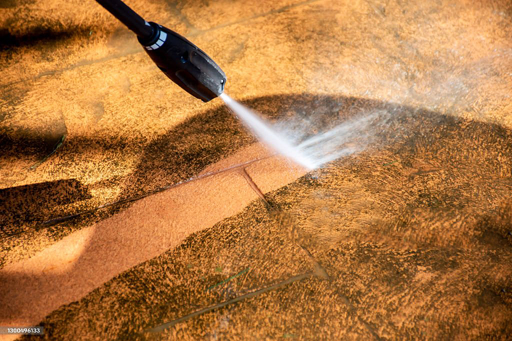 Large tile outdoor area power washing