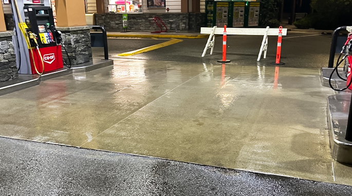 Power Wash Gas Station concrete around pumps and parking lot