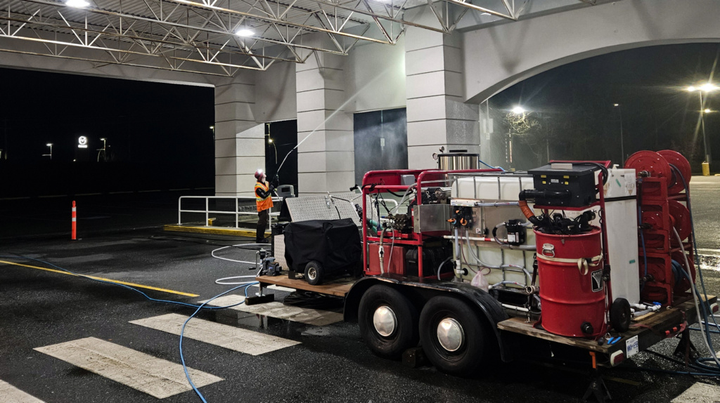 Modern home's lush yard, vibrant flowers, and green lawn